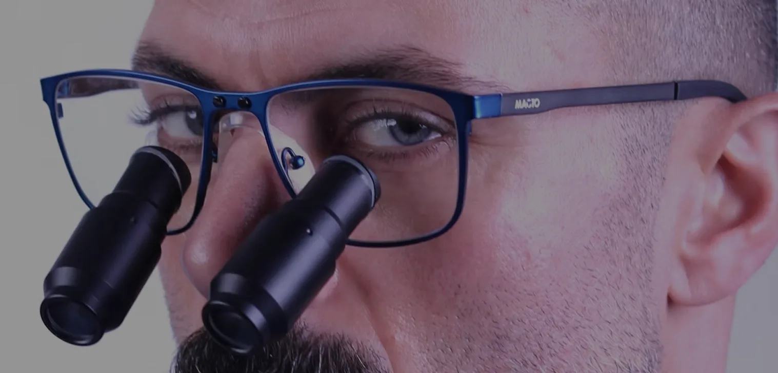 Dentist wearing MACTO loupes