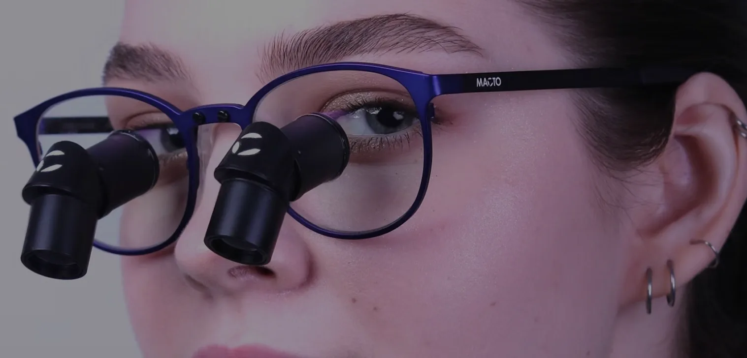 Clinician wearing MACTO ergonomic loupes